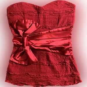 Red strapless lacy dress top with bow zips in the back padded bust size Small